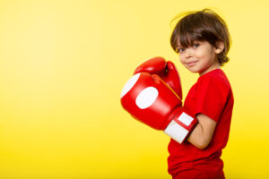 What size boxing glove should a 11 year old boy wear?